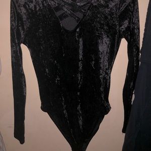 NEW! Super cute black long sleeved body suit